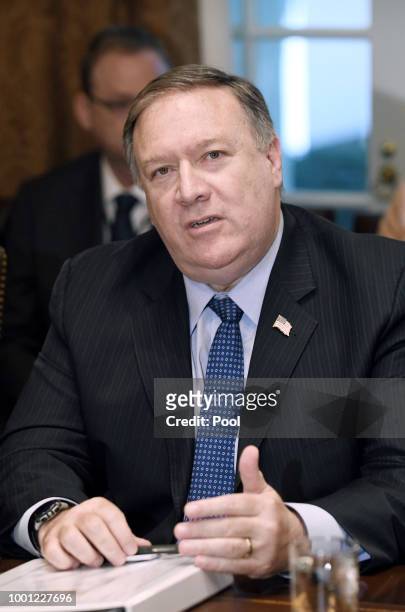 Secretary of State Mike Pompeo speaks during a cabinet meeting with U.S. President Donald Trump in the Cabinet Room of the White House, July 18, 2018...