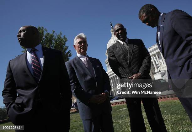 Sen. Tim Scott , Rep. Roger Williams , baseball Hall of Famer Andre Dawson and Rep. Cedric Richmond speak before the start of a press conference...