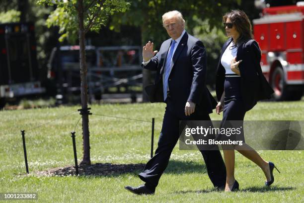 President Donald Trump and First Lady Melania Trump depart the White House in Washington, D.C., U.S., on Wednesday, July 18, 2018. Trump and Melania...