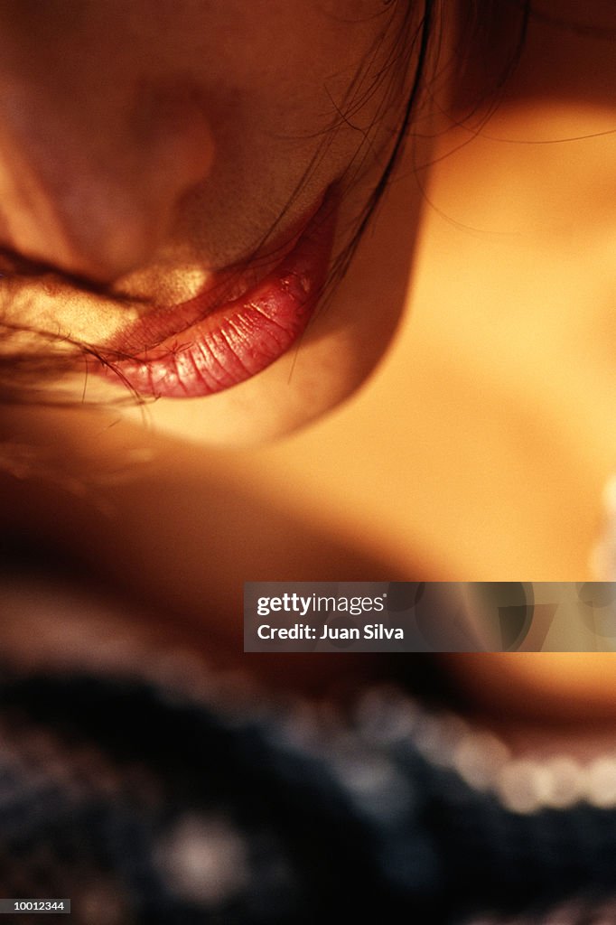 CLOSE-UP OF A WOMAN'S FACE