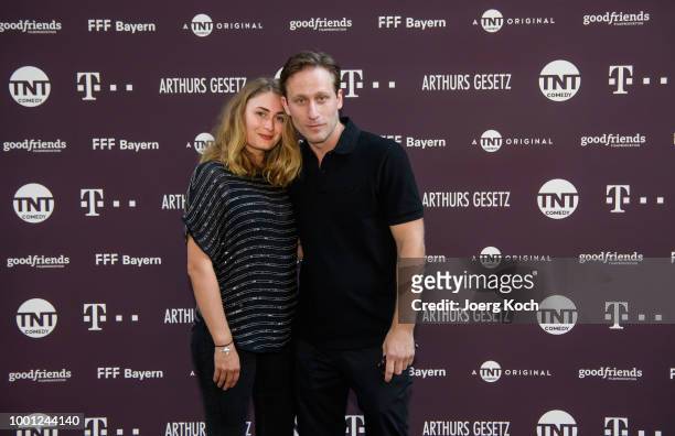 Actor Merlin Leonhardt and Anna Fjordmark during the series premiere of 'Arthurs Gesetz' at Filmtheater Sendlinger Tor on July 18, 2018 in Munich,...