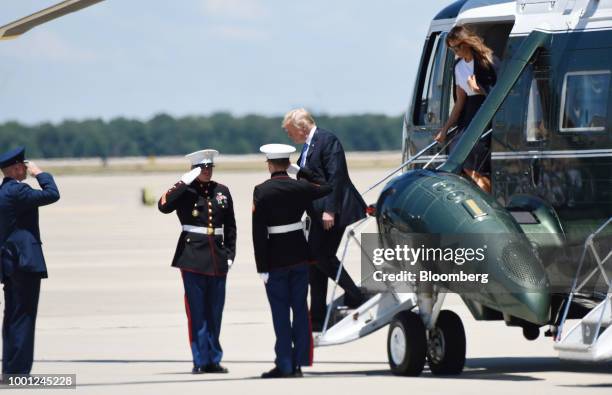 President Donald Trump and First Lady Melania Trump disembark Marine One while arriving at Joint Airforce Base Andrews, Maryland, U.S., on Wednesday,...