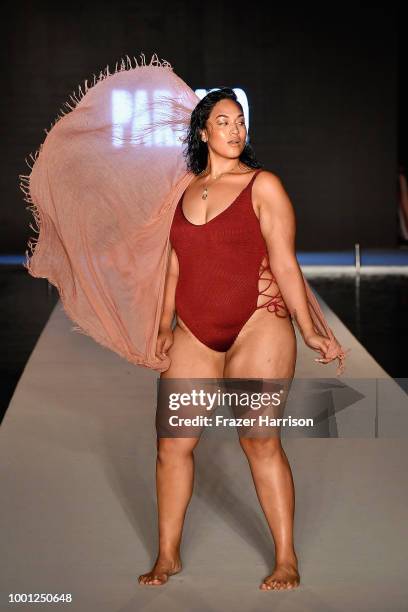 Model walks the runway for the 2018 Sports Illustrated Swimsuit show at PARAISO during Miami Swim Week at The W Hotel South Beach on July 15, 2018 in...