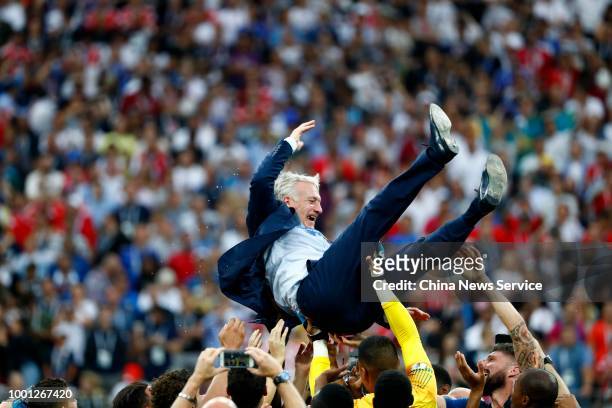 Head coach Didier Deschamps of France celebrates with his team after winning the 2018 FIFA World Cup Final between France and Croatia at Luzhniki...