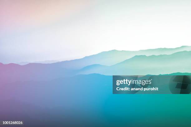 background abstract misty mountain range colourful wallpaper digital art gradiant pastel dramatic backdrop - india landscape stock pictures, royalty-free photos & images