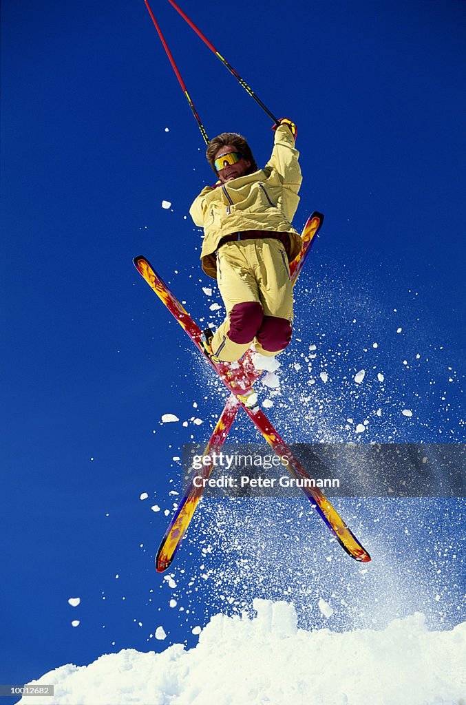 HOT DOG SKIER IN MIDAIR