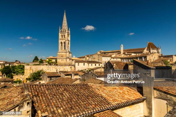 saint-emilion monolithic church and old town. bordeaux, france - aquitaine stock pictures, royalty-free photos & images