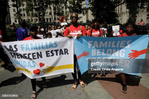 Activists, including childcare providers, parents and their children, protest against the Trump administrations recent family detention and...