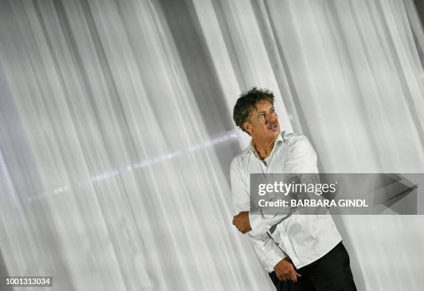 Austrian actor Tobias Moretti as 'Jedermann' performs on stage during a rehearsal of Hugo von Hofmannsthal's drama 'Jedermann' at the Domplatz ahead...