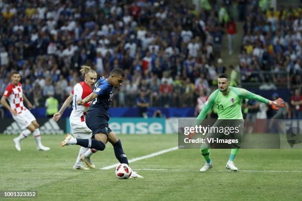 Dejan Lovren of Croatia, Domagoj Vida of Croatia, Kylian Mbappe of France, goalkeeper Danijel Subasic of Croatia during the 2018 FIFA World Cup...