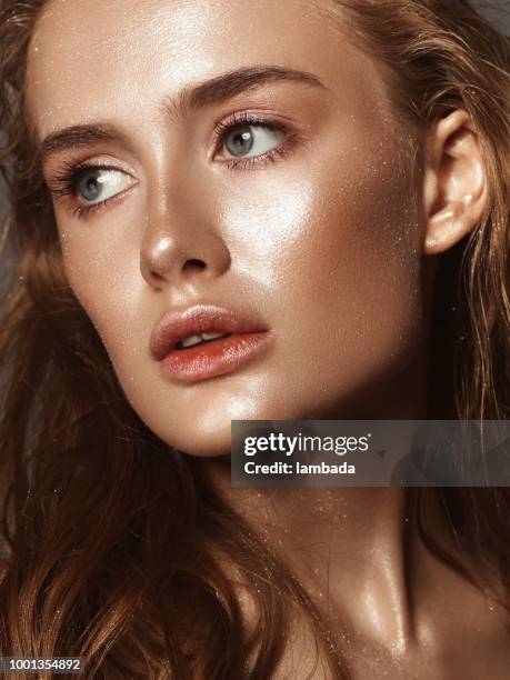 beautiful woman with shiny make-up - glitter face stock pictures, royalty-free photos & images