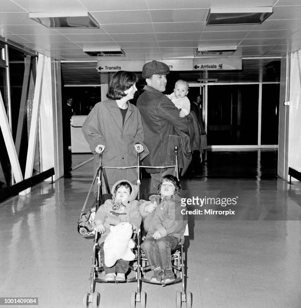 American film star Dustin Hoffman and his wife Lisa with their children Jake, aged 3, Rebecca, aged 1, and baby Max leaving Heathrow Airport for New...