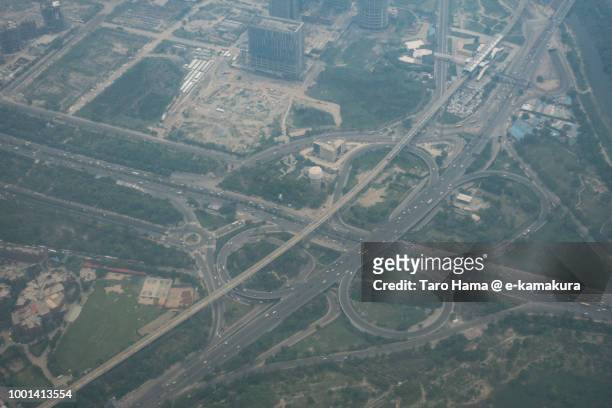 noida-greater noida expressway in india daytime aerial view from airplane - noida stock pictures, royalty-free photos & images