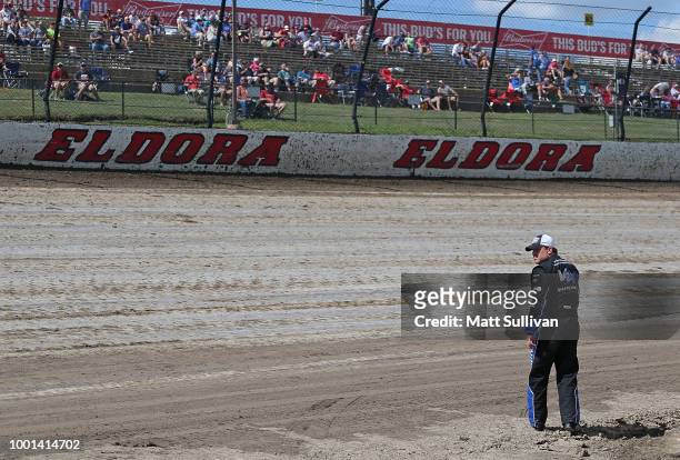 Ryan Newman, driver of the RyanNewmanVRExperience/MotoShieldPro Chevrolet, looks over the track prior to qualifying for the NASCAR Camping World...