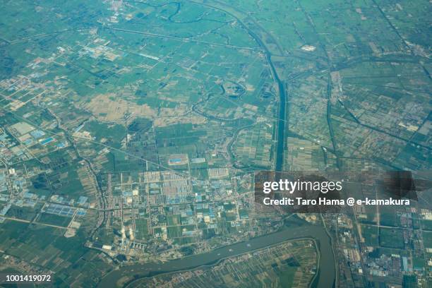 xiaogan city in hubei province in china daytime aerial view from airplane - xiaogan stock pictures, royalty-free photos & images