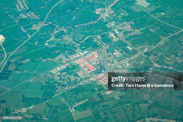 xiaogan city in hubei province in china daytime aerial view from airplane - xiaogan stock pictures, royalty-free photos & images