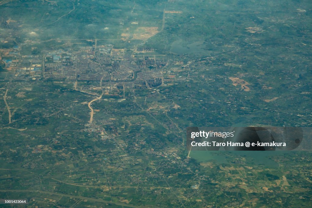 Jurong of Zhenjiang city in Jiangsu Province in China daytime aerial view from airplane