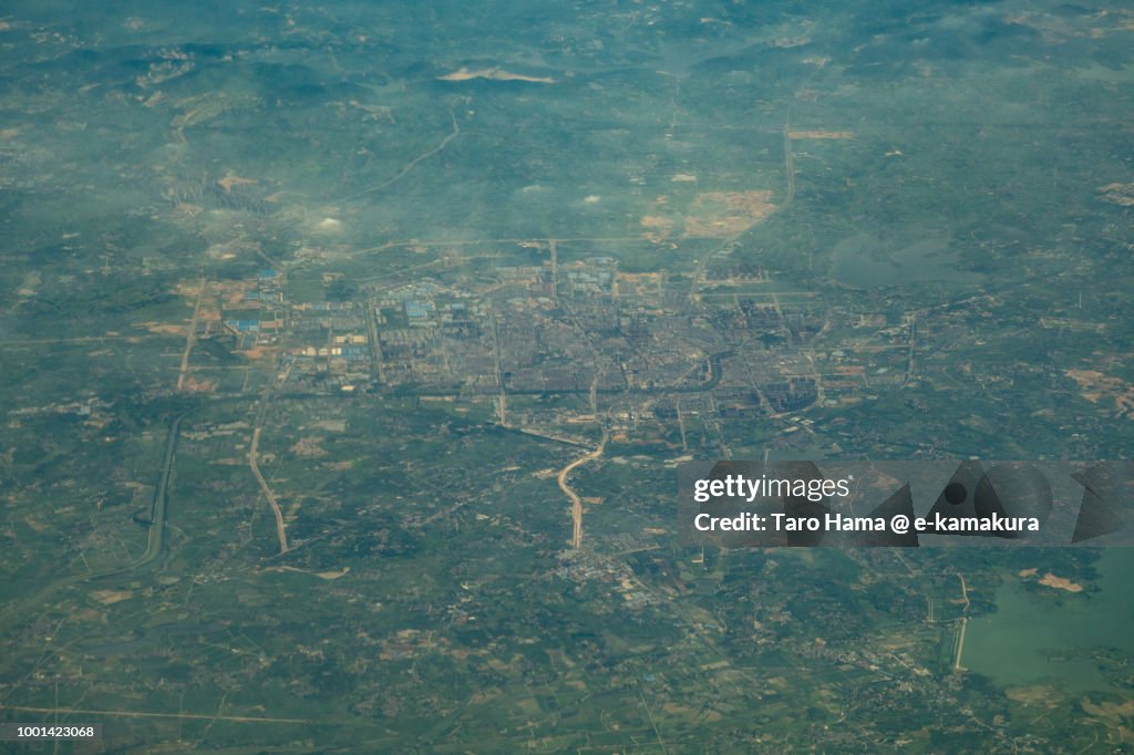 Jurong of Zhenjiang city in Jiangsu Province in China daytime aerial view from airplane