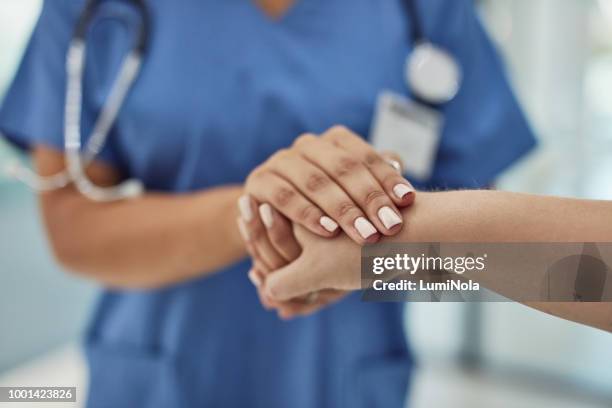 we truly do care - busy doctor stock pictures, royalty-free photos & images