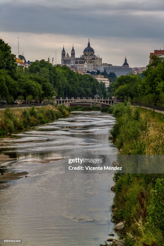View of the Manzanares River with the Cathedral of La Almudena in the background