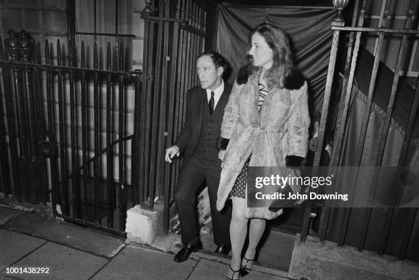 Canadian Prime Minister Pierre Trudeau leaving Annabel's nightclub with his girlfriend, London, UK, 7th January 1969.