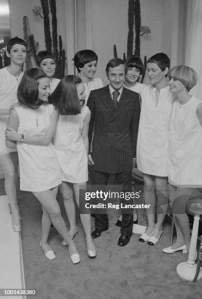 French fashion designer Marc Bohan with Dior's fashion models, France, 31st January 1969.