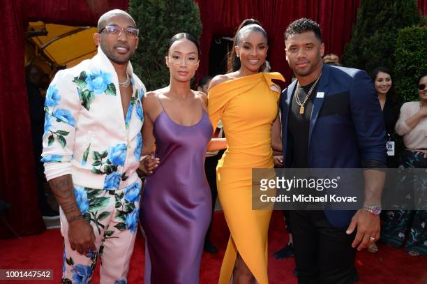 Football player Orlando Scandrick, Draya Michele, singer Ciara and fooball player Russell Wilson attend the 2018 ESPY Awards Red Carpet Show Live!...