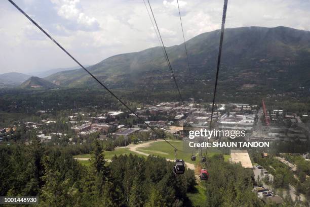 An aerial view of Aspen, Colorado, taken from a gondola descending from Aspen Mountain on July 7, 2018. - The posh ski resort is home to the Aspen...