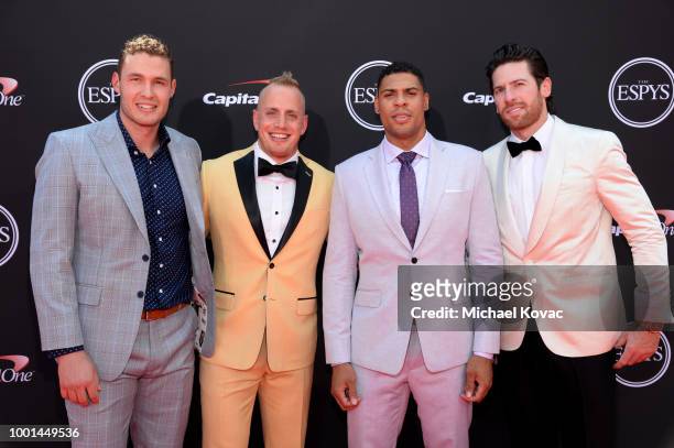 Hockey players Brayden McNabb, Nate Schmidt, Ryan Reaves and James Neal attend the 2018 ESPY Awards Red Carpet Show Live! Celebrates With Moet &...