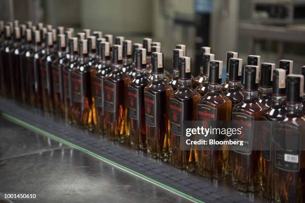 Sealed bottles of rum sit at the Ron Santa Teresa SACA distillery in El Consejo, Aragua state, Venezuela, on Tuesday, July 17, 2018. Once famed...