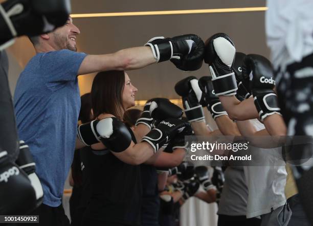 People perform various exercises as Sam Wood conducts a boxing class at Paramount Recreation Club on July 19, 2018 in Sydney, Australia.