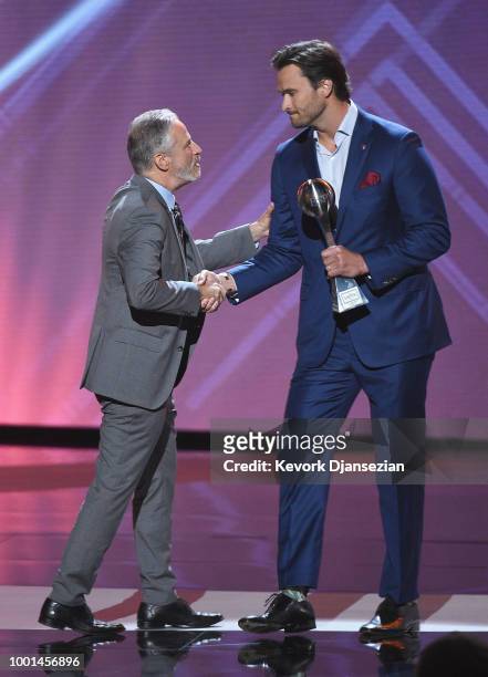 Honoree Jake Wood accepts the Pat Tillman Award for Service from Jon Stewart onstage during The 2018 ESPYS at Microsoft Theater on July 18, 2018 in...