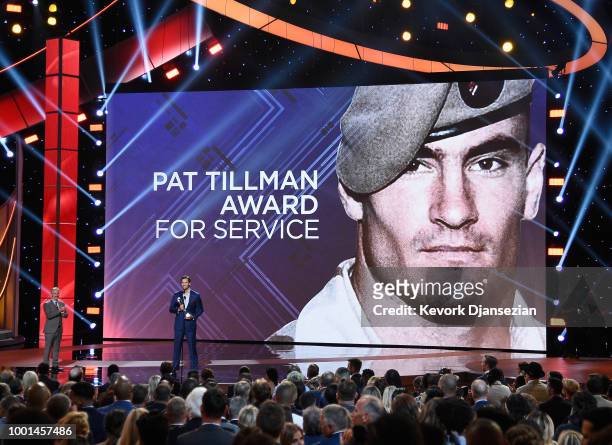 Honoree Jake Wood accepts the Pat Tillman Award for Service from Jon Stewart onstage during The 2018 ESPYS at Microsoft Theater on July 18, 2018 in...
