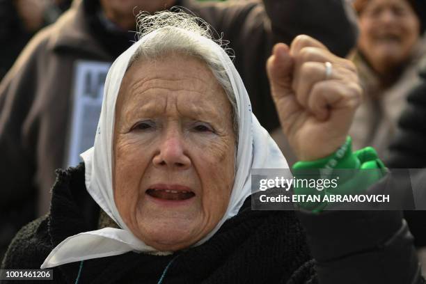 Argentinian co-founder of the "Madres de Plaza de Mayo" human rights association Nora Cortinas, wears a white -symbol of the organization- and a...