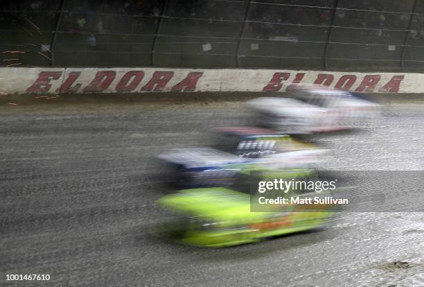 Cars race during the NASCAR Camping World Truck Series Eldora Dirt Derby at Eldora Speedway on July 18, 2018 in Rossburg, Ohio.