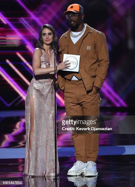 Actor Alison Brie and NFL player Von Miller speak onstage at The 2018 ESPYS at Microsoft Theater on July 18, 2018 in Los Angeles, California.