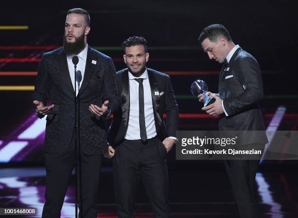 Players Dallas Keuchel, Jose Altuve and Alex Bregman of the Houston Astros accept the award for Best Team onstage at The 2018 ESPYS at Microsoft...
