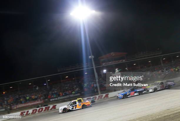 Chase Briscoe, driver of the Ford Ford, leads a pack of trucks during the NASCAR Camping World Truck Series Eldora Dirt Derby at Eldora Speedway on...