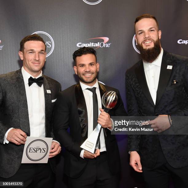 Players Alex Bregman, Jose Altuve and Dallas Keuchel of the Houston Astros pose with the award for Best Team during The 2018 ESPYS at Microsoft...