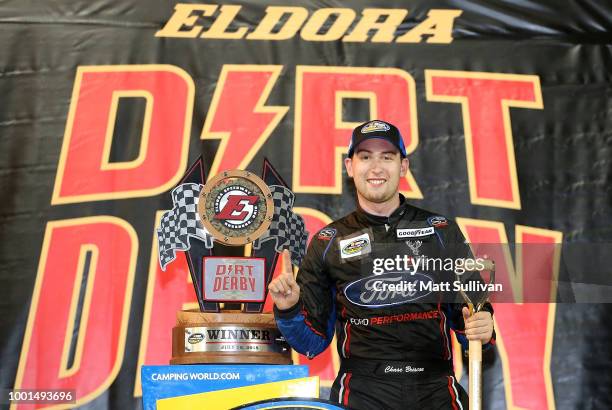 Chase Briscoe, driver of the Ford Ford, poses with the trophy after the NASCAR Camping World Truck Series Eldora Dirt Derby at Eldora Speedway on...