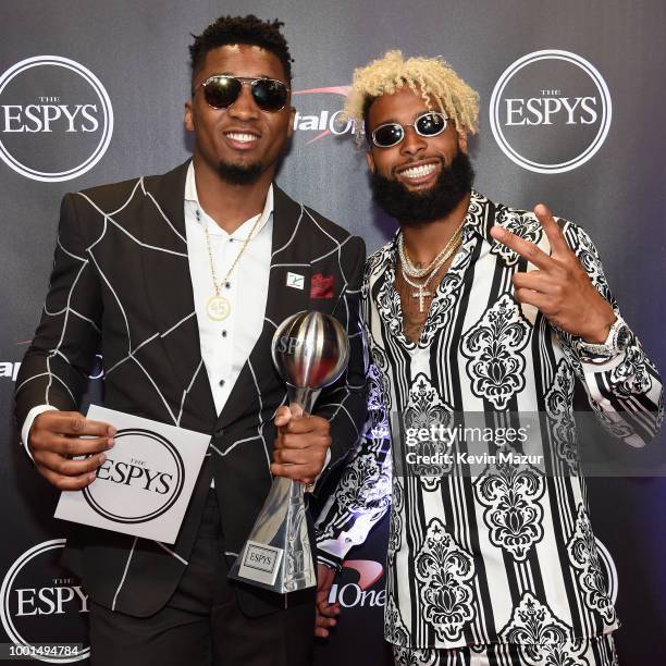 Player Donovan Mitchell poses with his Breakthrough Athlete award with NFL player Odell Beckham Jr. At The 2018 ESPYS at Microsoft Theater on July...