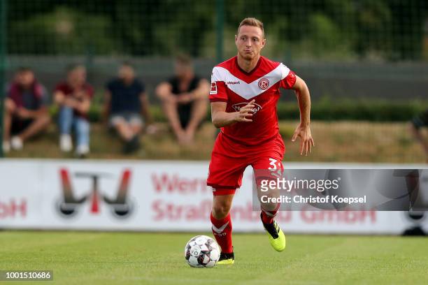 Robin Bormuth of Duesseldorf runs with the ball during the Pre Season Friendly match between FC Wegberg-Beeck and Fortuna Duesseldorf at Waldstadion...