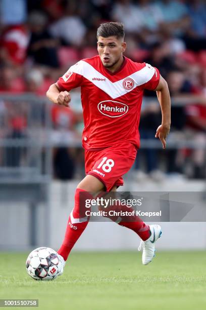 Goekhan Guel of Duesseldorf runs with the ball during the Pre Season Friendly match between FC Wegberg-Beeck and Fortuna Duesseldorf at Waldstadion...