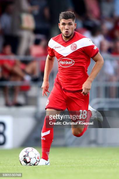 Goekhan Guel of Duesseldorf runs with the ball during the Pre Season Friendly match between FC Wegberg-Beeck and Fortuna Duesseldorf at Waldstadion...