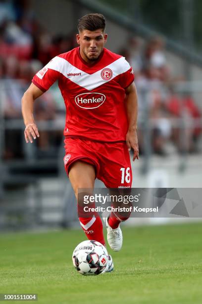 Goekhan Guel of Duesseldorf runs with the ball during the Pre Season Friendly match between FC Wegberg-Beeck and Fortuna Duesseldorf at Waldstadion...