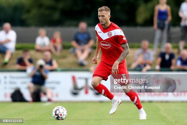 Andre Hoffmann of Duesseldorf runs with the ball during the Pre Season Friendly match between FC Wegberg-Beeck and Fortuna Duesseldorf at Waldstadion...