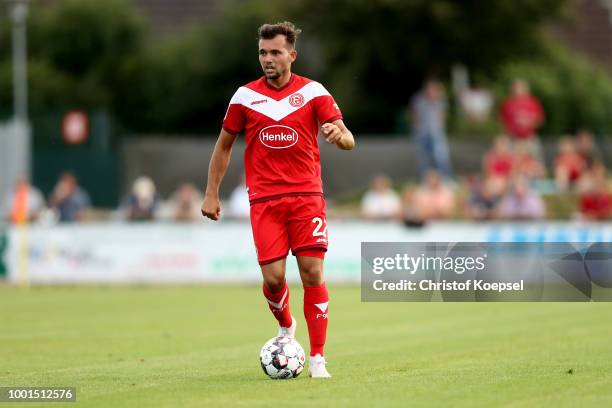 Kevin Stoeger of Duesseldorf runs with the ball during the Pre Season Friendly match between FC Wegberg-Beeck and Fortuna Duesseldorf at Waldstadion...