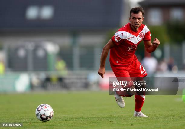 Kevin Stoeger of Duesseldorf runs with the ball during the Pre Season Friendly match between FC Wegberg-Beeck and Fortuna Duesseldorf at Waldstadion...