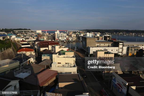 Buildings stand in the Misakimachi area of Miura, Japan, on Saturday, July 14, 2018. Japan is scheduled to release consumer price index figures for...