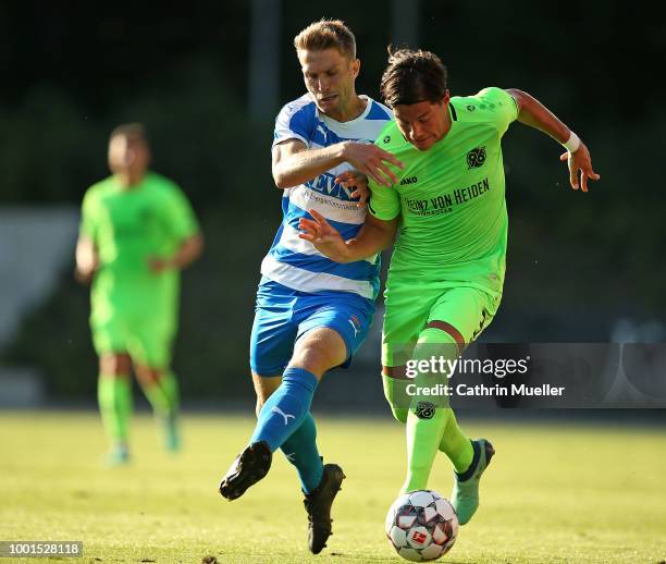 Miiko Albornoz of Hannover and Florian Beil of Wacker Nordhausen battles for the ball during the pre-season friendly match between Hannover 96 and...